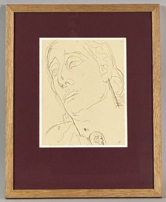 drawing of a woman ' s face in a wooden frame on a wall