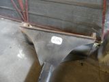 an image of a piece of metal in a garage