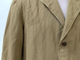 an image of a man ' s jacket on a mannequin head