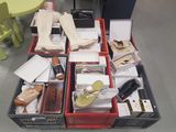 a lot of boxes with shoes and other items in them