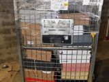 a metal cart with a bunch of boxes on it