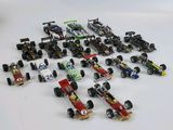 a lot of toy cars that are sitting on a table