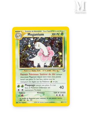 a close up of a pokemon card on a white surface