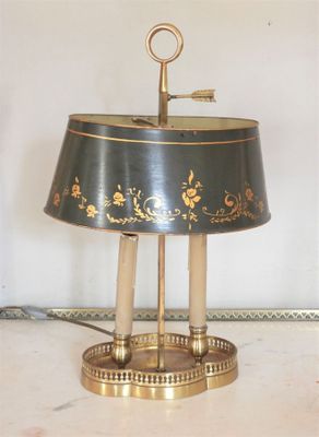 a lamp that is sitting on a table in a room
