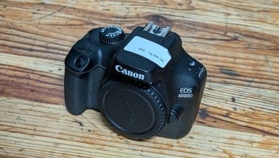 a camera that is sitting on a wooden table