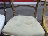 two chairs sitting next to each other in a room