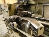 a machine that is working on a piece of metal