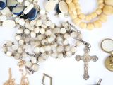 a bunch of jewelry that is laying out on a table