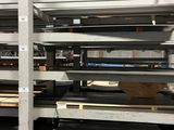 a large rack of shelves in a warehouse filled with pallets