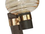 an image of a wall light with a glass shade on it