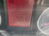 a close up of a car dashboard with a speedometer