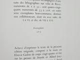 an open book with a black and white image of a clock on it