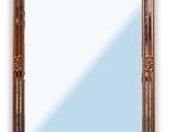 On voit un miroir richement sculpté sur fond blanc.