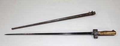 an old sword and an old sword on a white surface