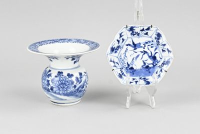 a blue and white vase and a blue and white bowl