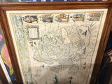 a picture of a picture of a map hanging on a wall