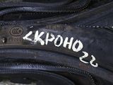 a close up of a pair of shoes with a tag on them