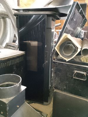 a lot of old appliances that are sitting in a room