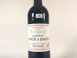 a bottle of wine that is sitting on a table