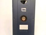 a close up of a cell phone on a white surface