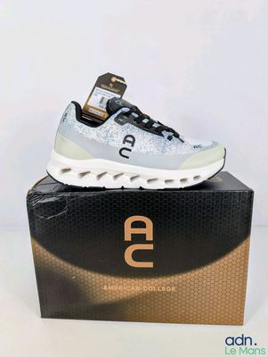 a box with a pair of sneakers on top of it