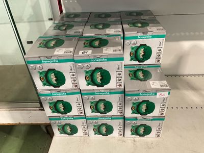 several boxes of toothpaste are stacked on a shelf in a store