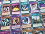 a table topped with lots of different types of cards on it