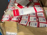a box of mail sitting on top of a pallet