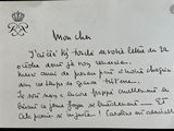 a note written to a man who is holding a cell phone