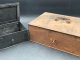 two old suitcases sitting next to each other on a table
