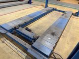 a picture of a metal table with a couple of legs on it