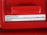 a close up of a red box with a label on it
