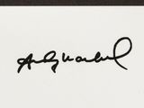 a black and white photo of a person ' s signature on a piece of paper