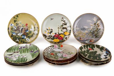 six plates with different designs on them on a white surface
