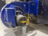a blue machine that is sitting in a room