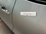 a picture of a car with a measuring tape on the door