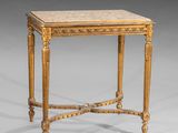 une petite table avec un plateau en marbre posé sur un piètement en bois