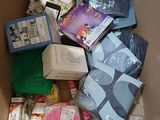 a cardboard box filled with various items that are in it