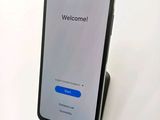 an image of a cell phone with a welcome screen on it