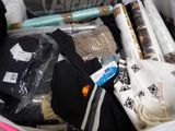 a bag full of items that are sitting on the floor