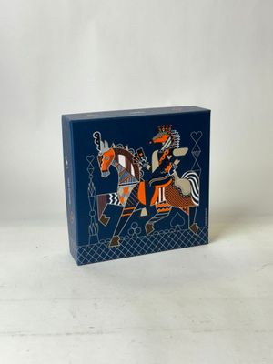 an image of a blue box with a picture of a man riding a horse