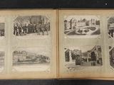 an old black and white photo of an open book with pictures of people
