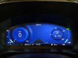 the dashboard of a car with a digital display on it