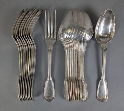 five spoons, two forks, and a spoon on a table