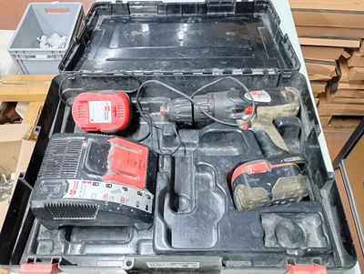 a tool box with tools in it sitting on a table