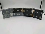 a close up of a group of black and white batteries