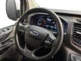 a steering wheel and dashboard of a ford transit vehicle