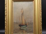 une image représentant un tableau d'un voilier dans un cadre doré