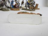 a small white box with a picture of a group of people on it