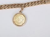 an image of a gold chain bracelet with a coin on it